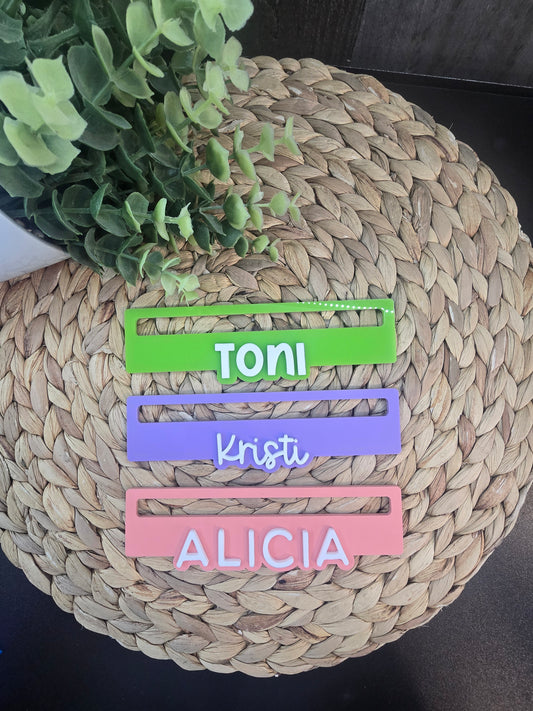 Three personalized Mahjong line readers in green, purple, and pink acrylic, custom engraved with the names Toni, Kristi, and Alicia